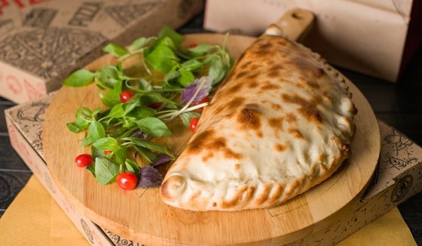 Hot, cheesy panzerotti baked fresh